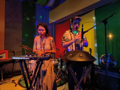 A live music and wall-painting session.